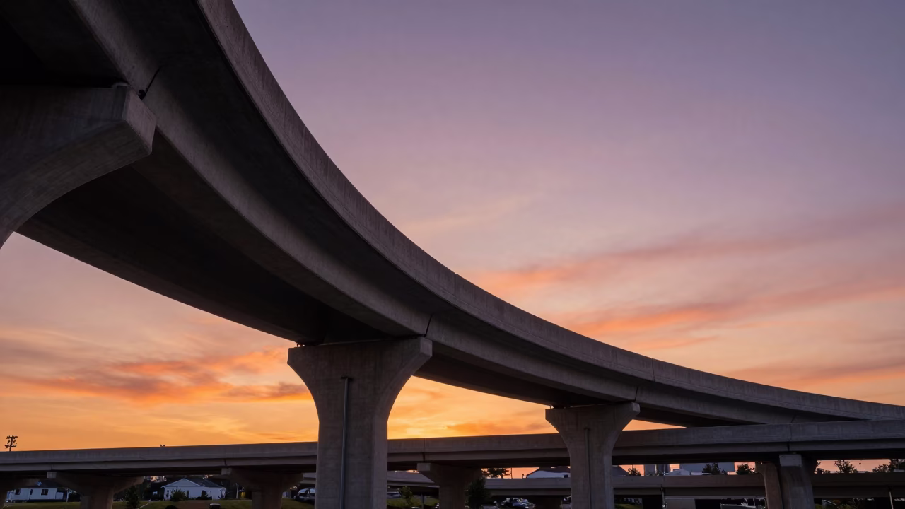 Nashville Tennessee Sunset View of Interstate Overpass Ramp Slicing Across Violet Evening Sky in in Nashville, Tennessee, United States
