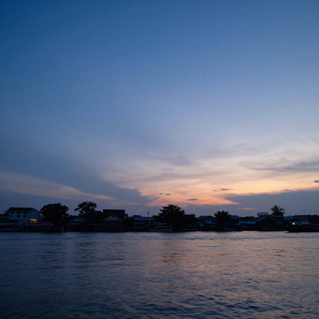 Nautical Dawn Horizon Over Bangkok Chao Phraya River with Distant City Skyline in in Bangkok, Thailand