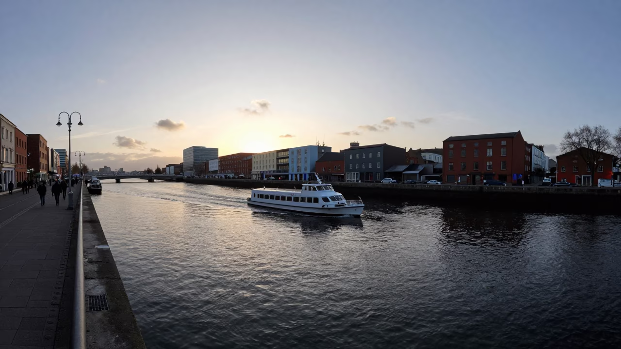 Nautical Dawn in Dublin Ireland Water Taxi Navigating Canal Near Ha'penny Bridge in in Dublin, Ireland