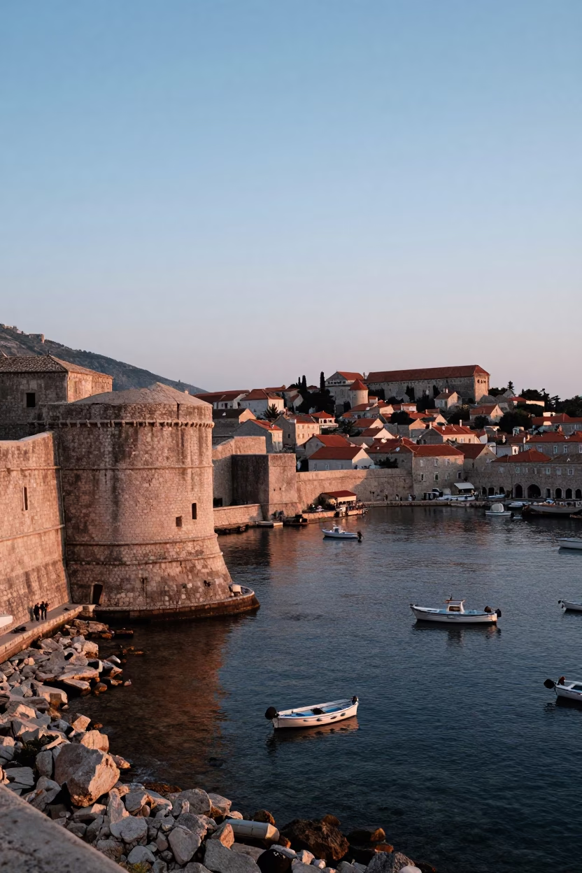 Nautical Dawn in Dubrovnik Croatia with Old City Walls and Harbor Boats in in Dubrovnik, Croatia