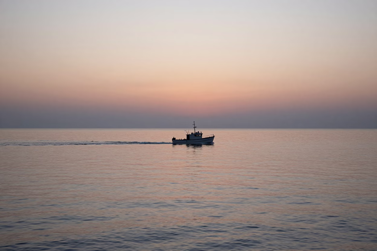 Nautical Dawn in Naples Italy Coastal Horizon with Fishing Boat Wake in in Naples, Italy