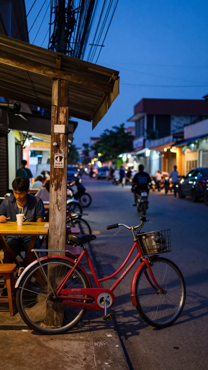 Nautical Dawn in Phnom Penh Cambodia Bicycle Cafe Street Scene in in Phnom Penh, Cambodia