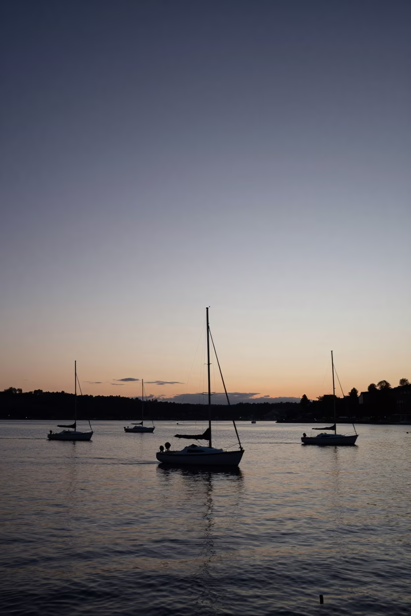 Nautical Dawn in Stockholm Sweden with Silhouetted Boats and Early Morning Light in in Stockholm, Sweden