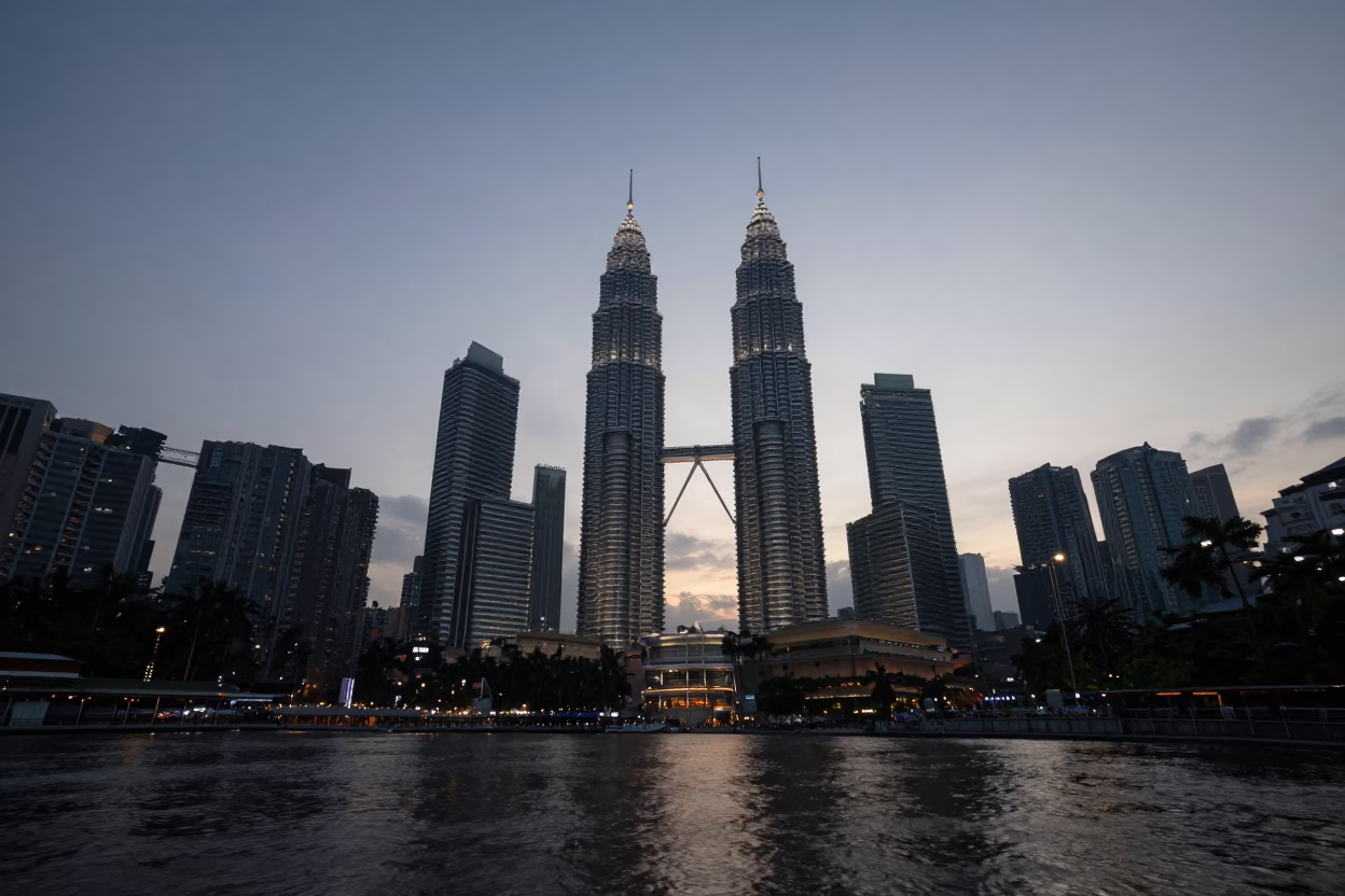 Nautical Dawn Kuala Lumpur Petronas Towers and River Scene in in Kuala Lumpur, Malaysia