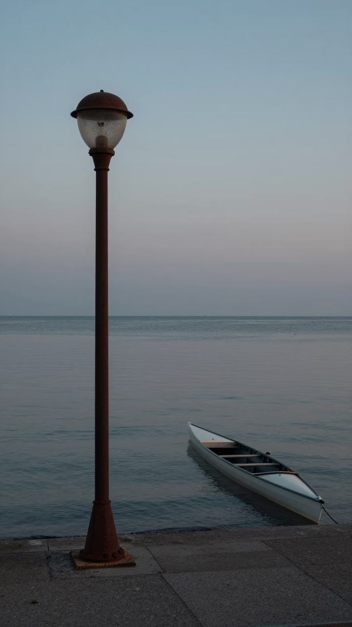 Nautical Dawn Lake Michigan Waterfront with Rusty Lamp Post and Rowing Shell in in Chicago, Illinois, United States