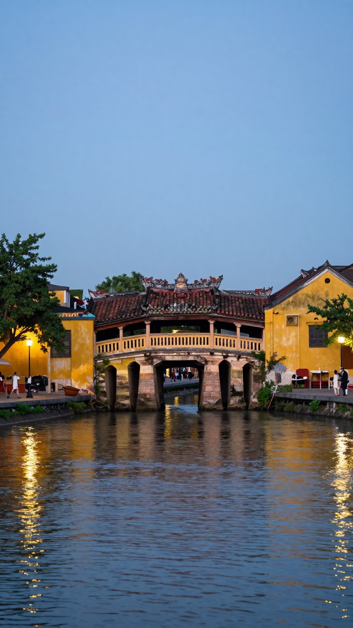 Nautical Dawn Light Illuminating Ancient Hoi An Architecture and Riverside Morning Activity in in Hoi An, Vietnam