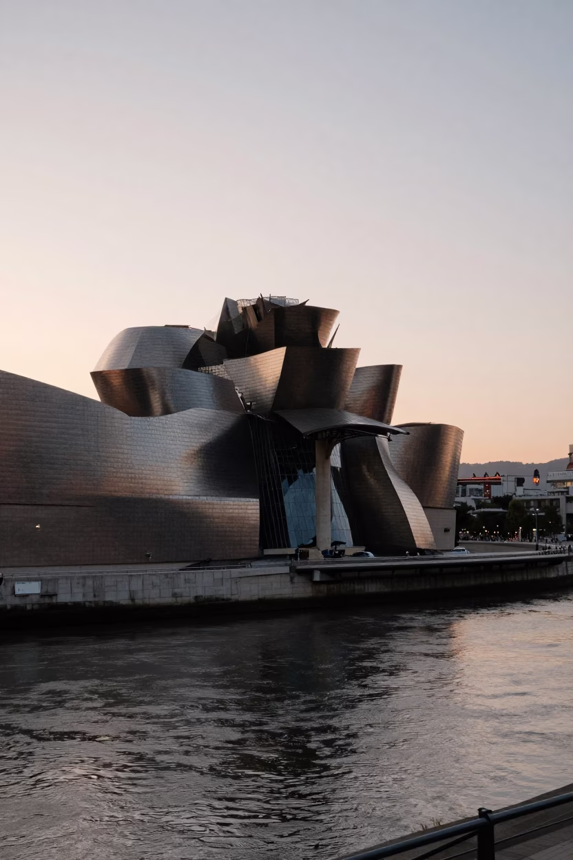 Nautical Dawn Light on Bilbao Guggenheim Museum and Nervion River Promenade in in Bilbao, Spain