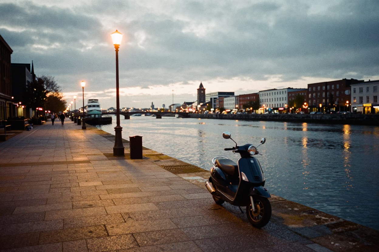 Nautical Dawn Light on Dublin Harbor Promenade with Parked Scooter and Rusty Railings in in Dublin, Ireland