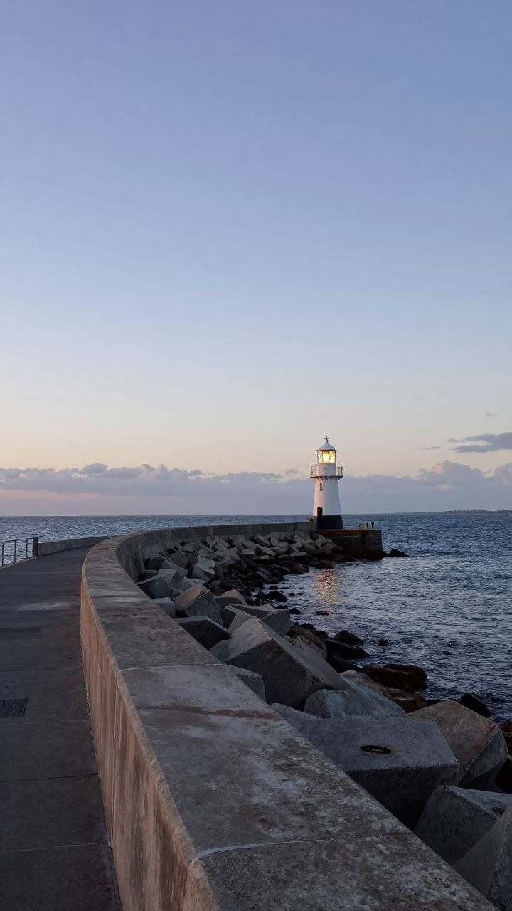 Nautical Dawn Light on Melbourne Breakwater Beacon and Harbor Curve in in Melbourne, Victoria, Australia