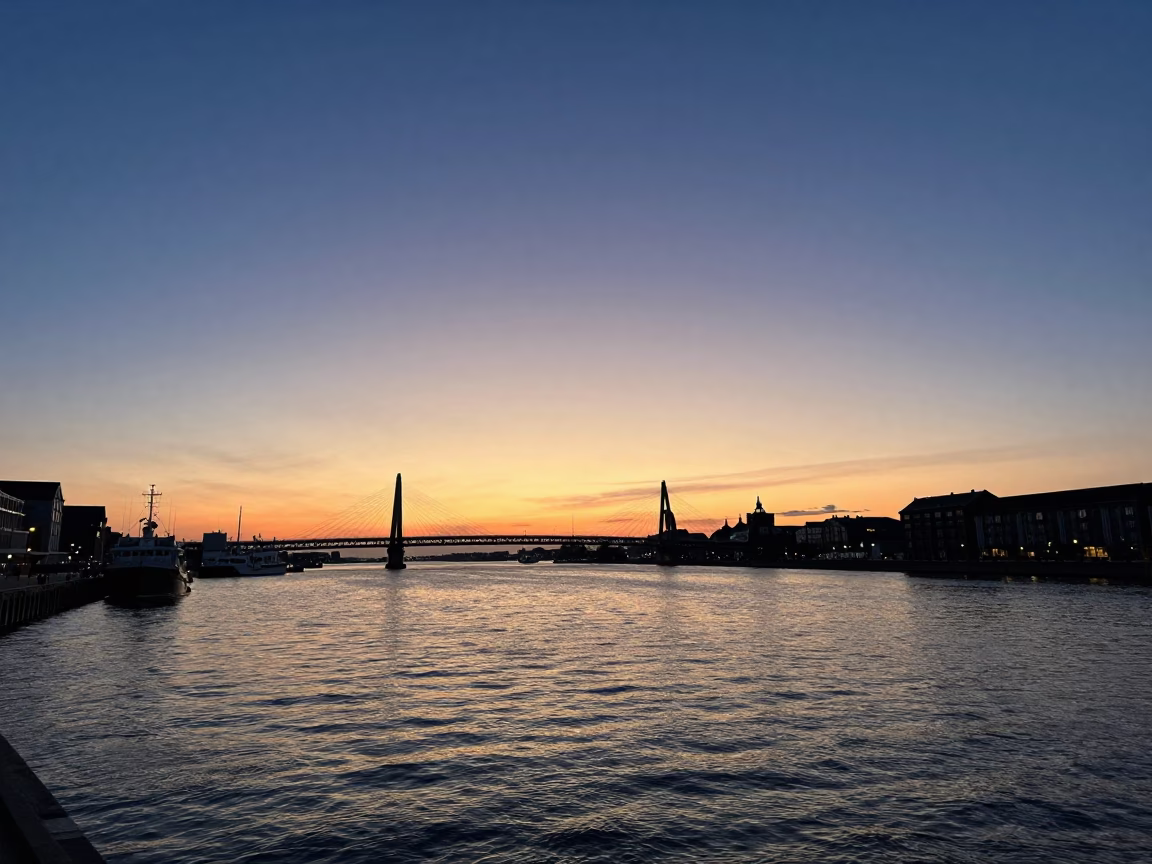 Nautical Dawn Silhouette of Bridge Pier in Copenhagen Harbor Waters in in Copenhagen, Denmark