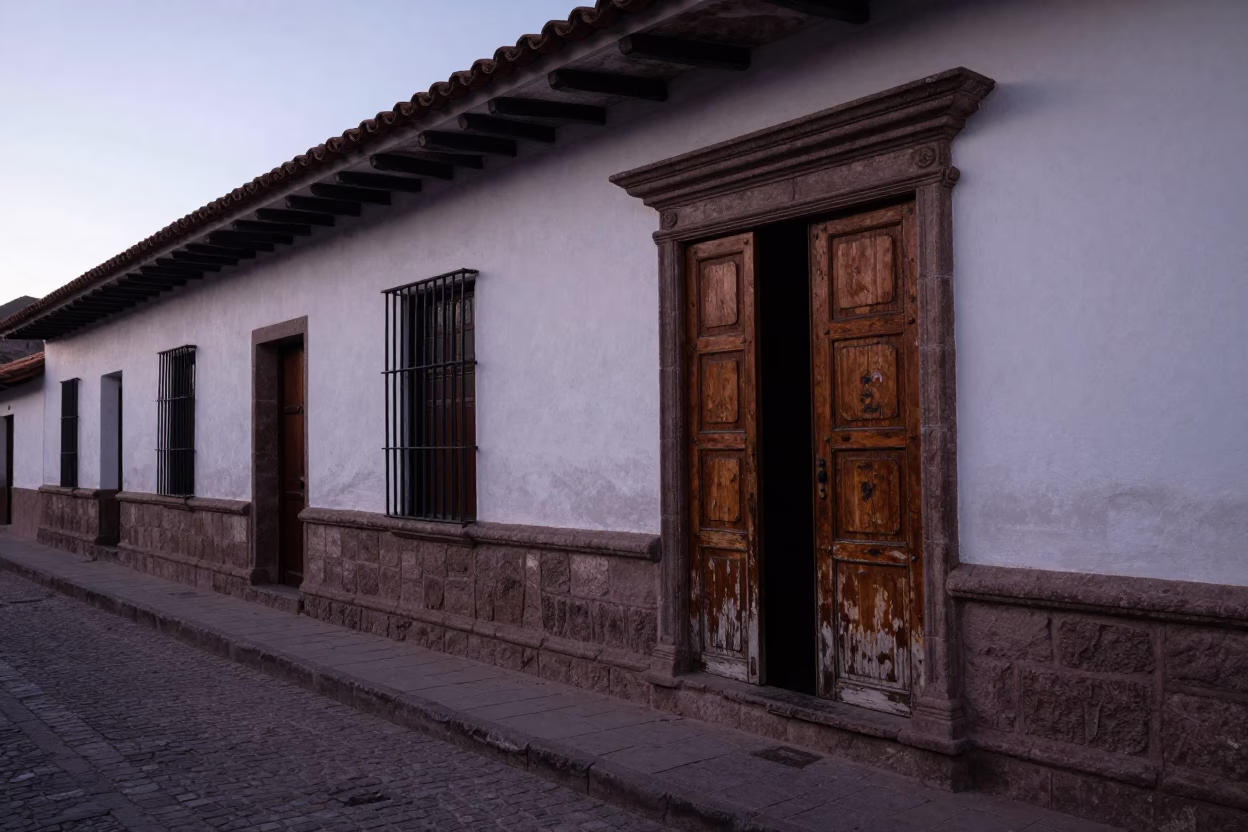 Nautical Dawn Street Scene in Cusco Peru with Wooden Cupboard Doors and Cobblestone Plaza in in Cusco, Peru