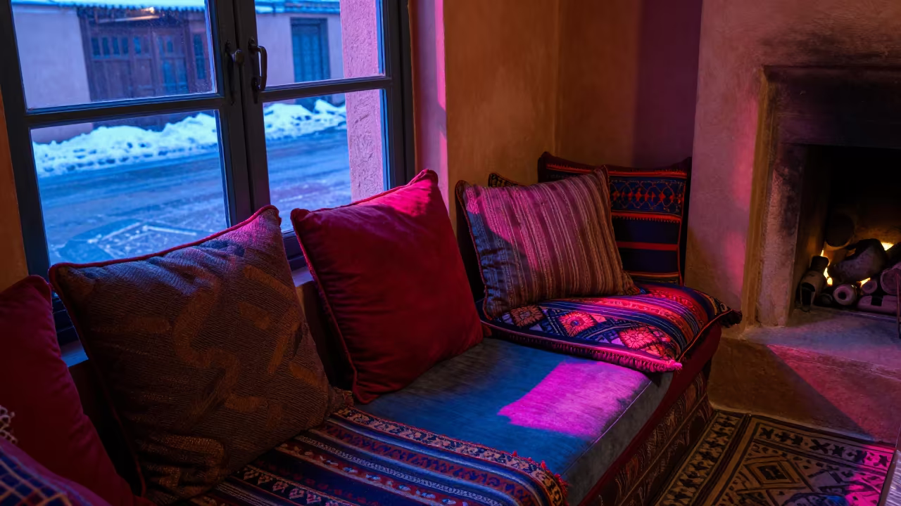 Neon Lit Pillow Pile on Windowseat in by a crackling fireplace near Souks, Marrakech