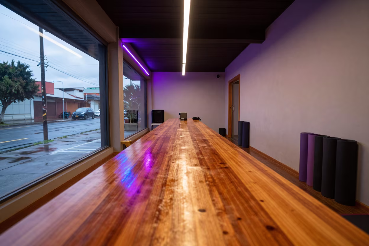 Neon Reflected Desk in Ibarra Yoga Studio in inside a yoga studio before the session begins in Ibarra