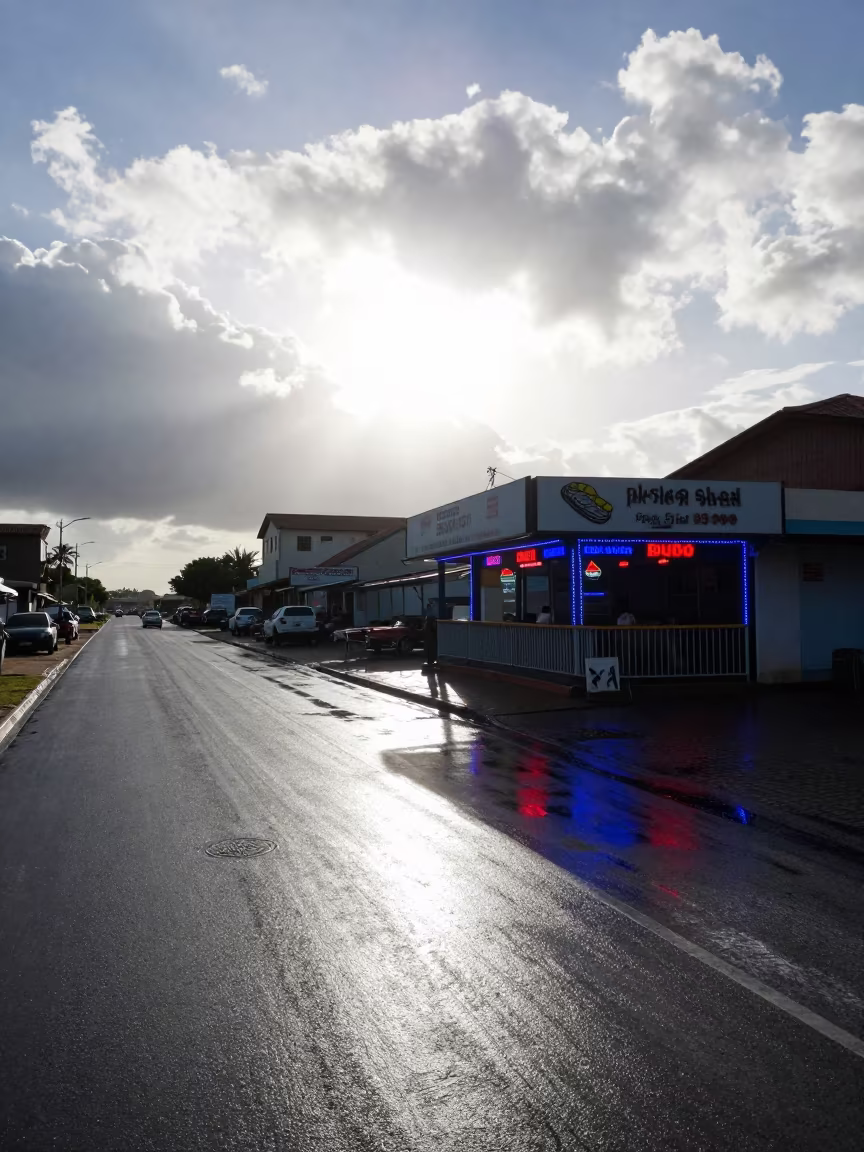 Neon Sushi Bar Reflections in Dar es Salaam Street in outside a corner cafe in Dar es Salaam