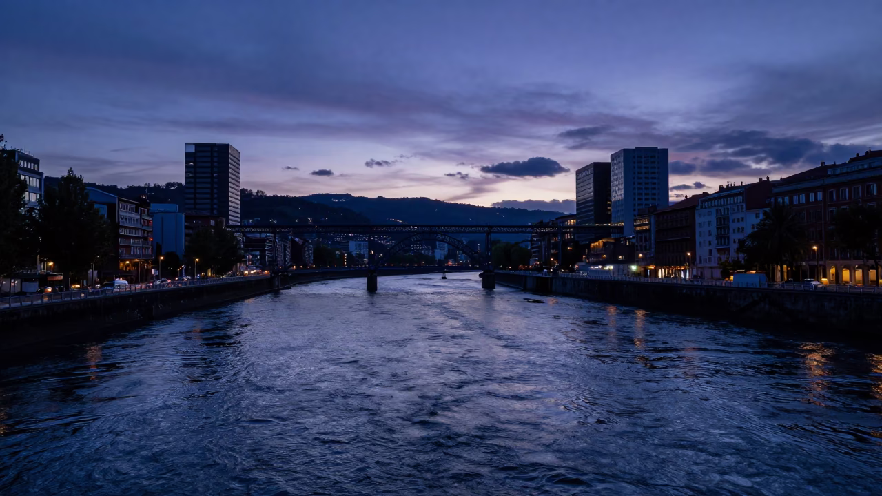 Nervion River in Bilbao at Indigo Twilight After Sunset in in Bilbao, Spain