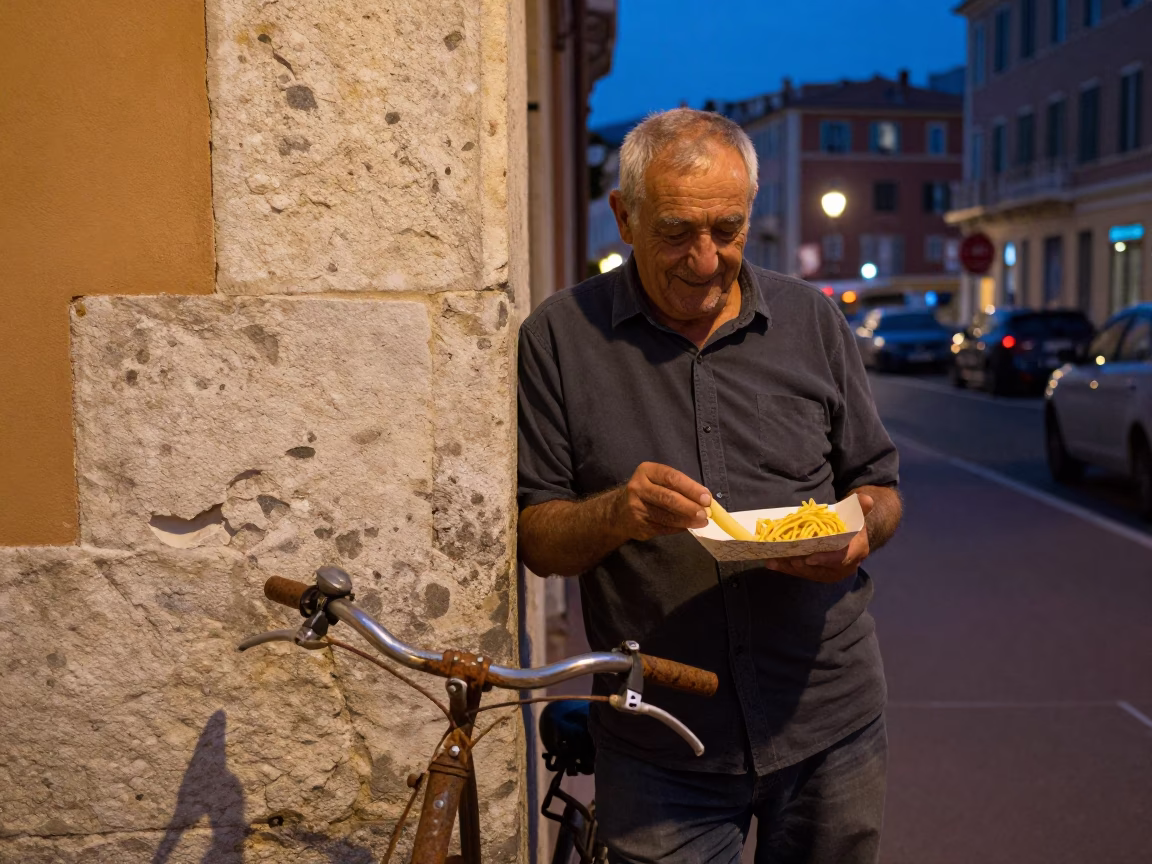 Nice France Evening Street Scene with Rusty Bicycle Handle and Mossy Cobblestone in in Nice, France