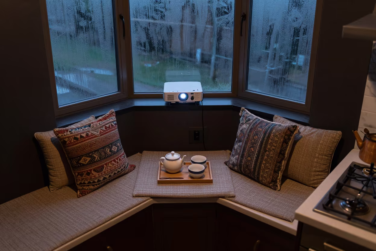 Night Bay Window Seat with Tea Set in Bangui Kitchen in in a cozy kitchen in Bangui