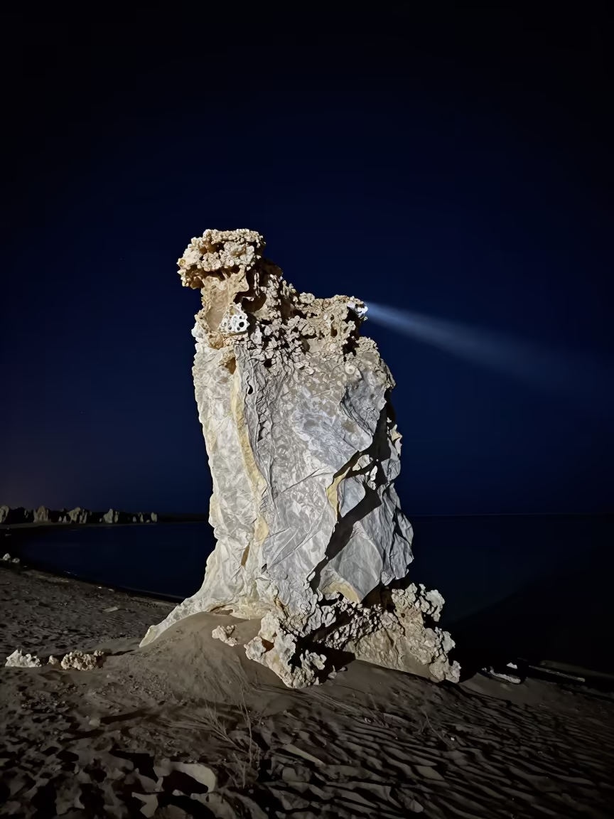 Night Beam Illuminates Mongolian Tufa Tower in in Mongolia