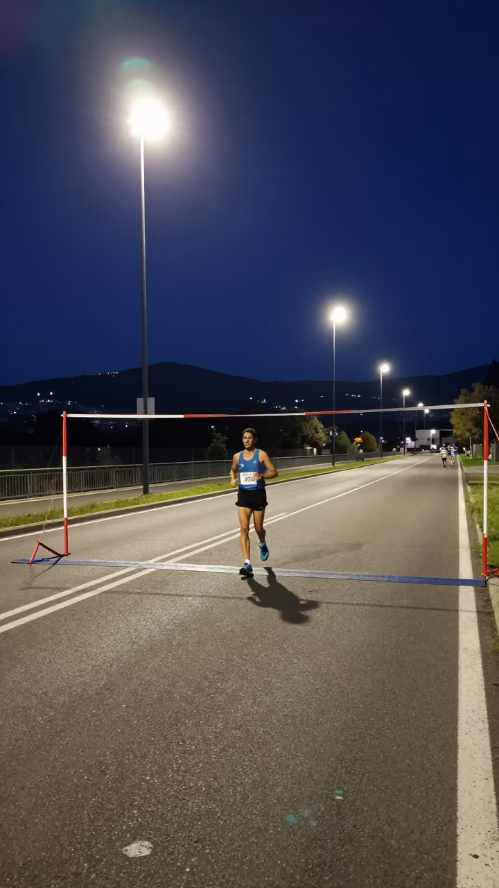 Night Marathon Runner Under Floodlights Near Salerno in at a roadside stop near Salerno