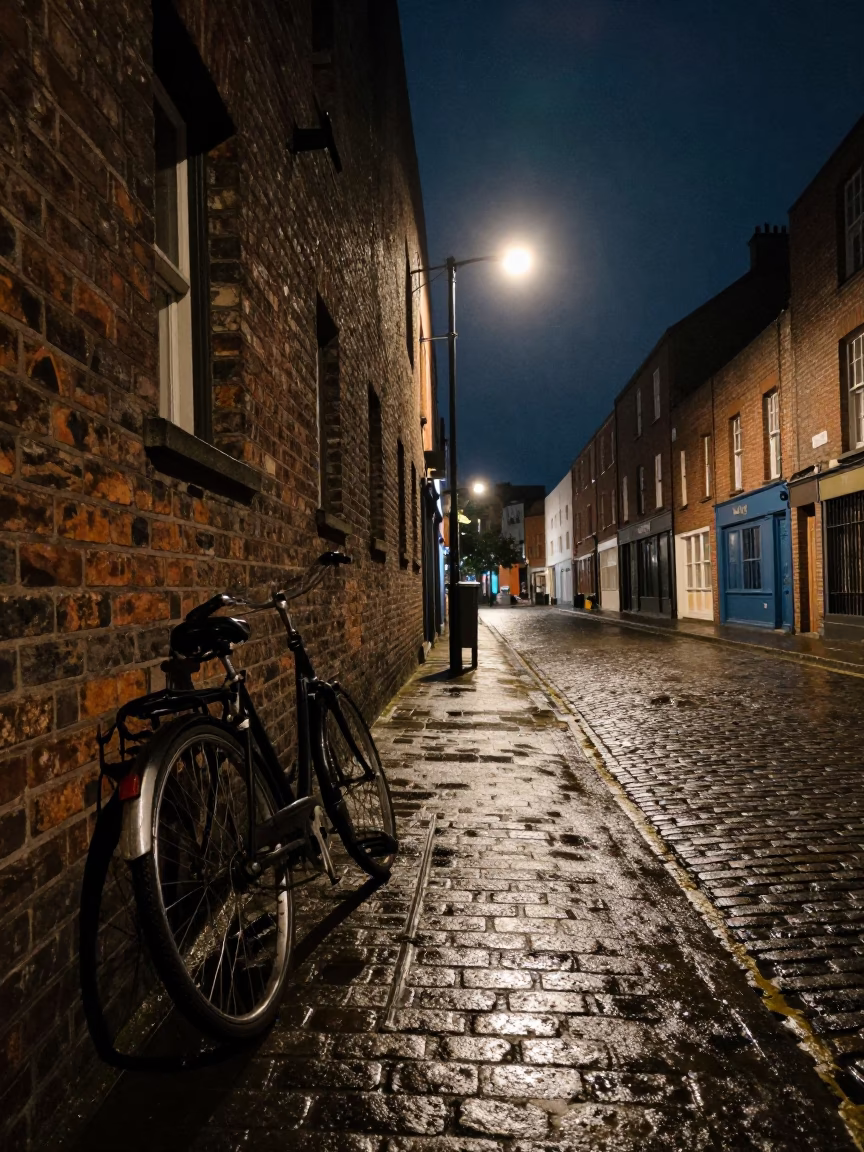 Night Street Scene in Dublin Ireland with Vintage Bicycle and Cobblestone Architecture in in Dublin, Ireland