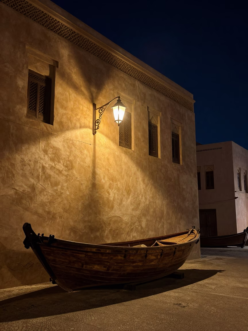 Night street scene in Muscat Oman with traditional dhow wood textures and starry sky in in Muscat, Oman