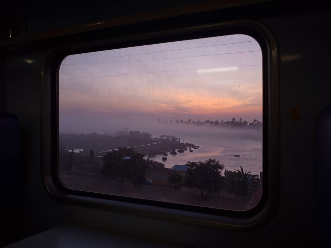 Night Train Window at Sunset Harbor in beside a fogbound harbor mouth in Burkina Faso