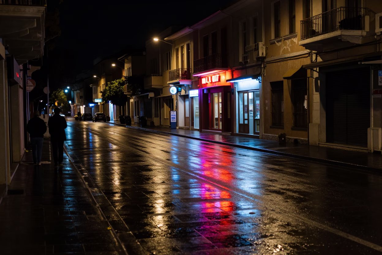 Nighttime Athens Street Scene with Neon Reflections and Urban Architecture in in Athens, Greece
