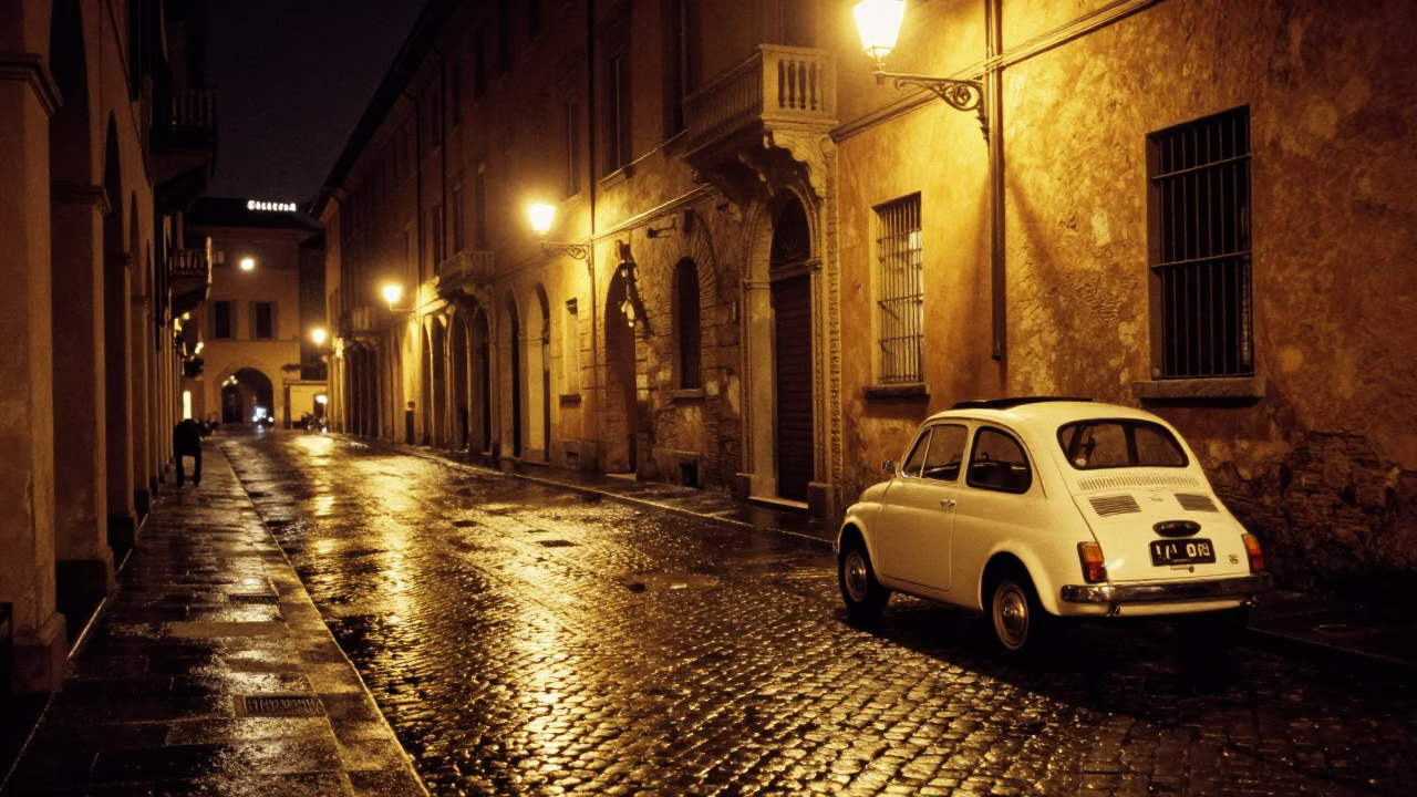 Nighttime Bologna Italy Street Scene with Vintage Car and Illuminated Building Facades in in Bologna, Italy