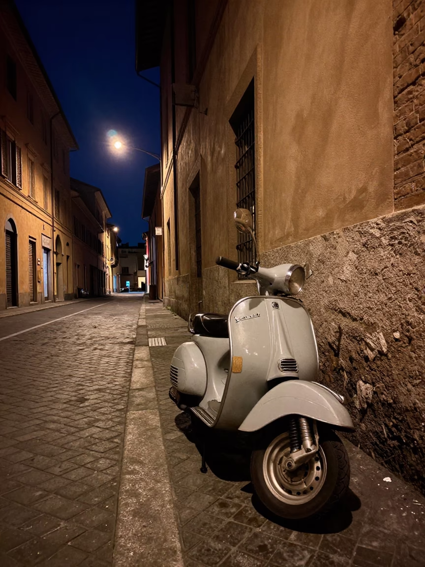 Nighttime Bologna Street Scene with Vintage Scooter and Urban Details in in Bologna, Italy