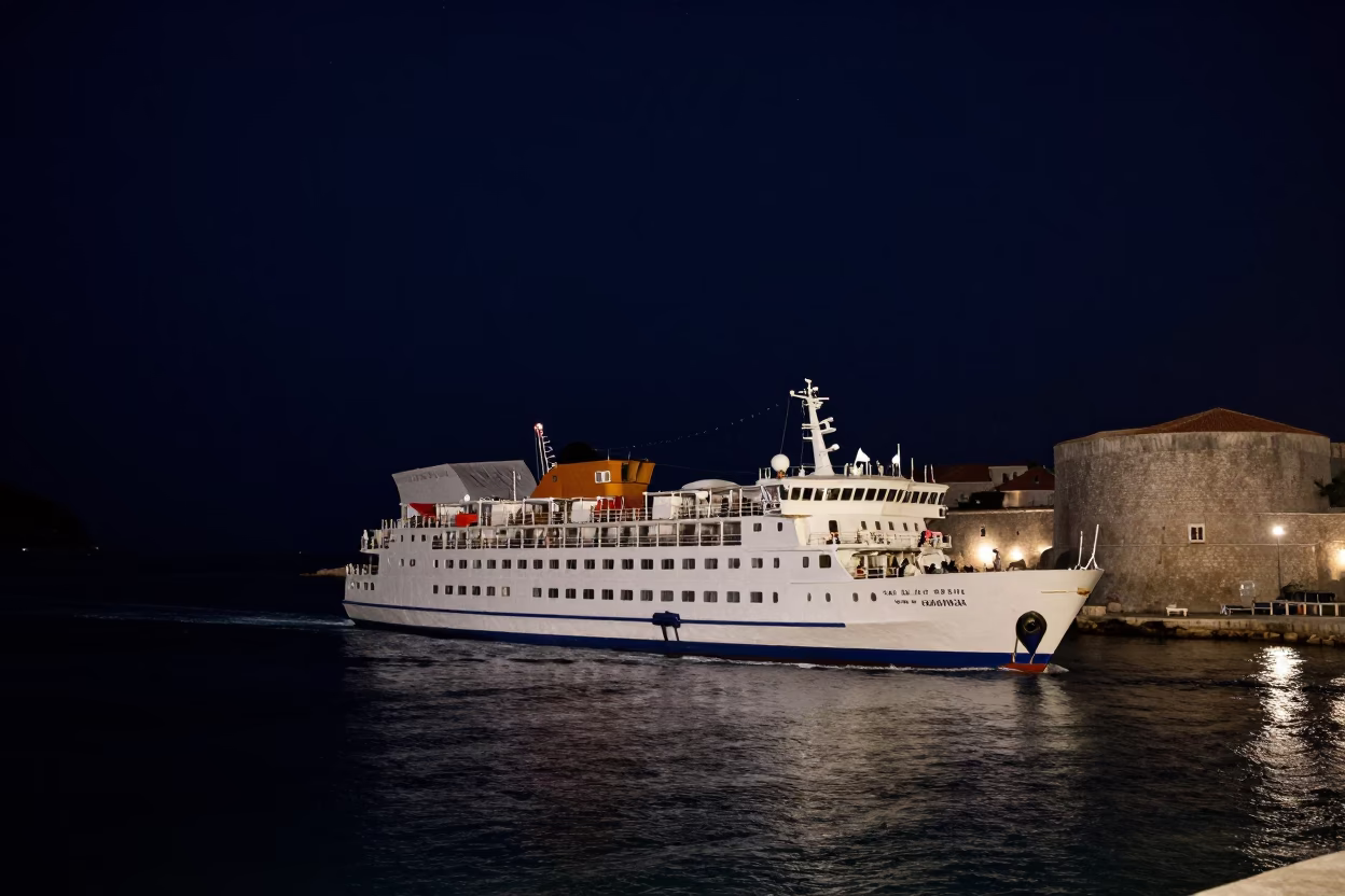 Nighttime Dubrovnik Harbor Ferry Departure Under Deep Starry Sky in in Dubrovnik, Croatia