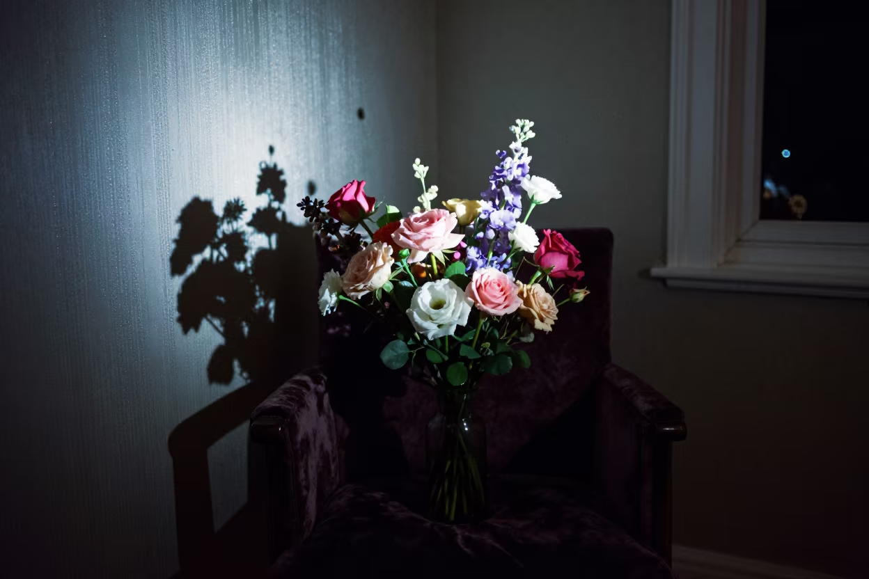 Nighttime Flower Arrangement on Velvet Chair in on a velvet chair in Buea