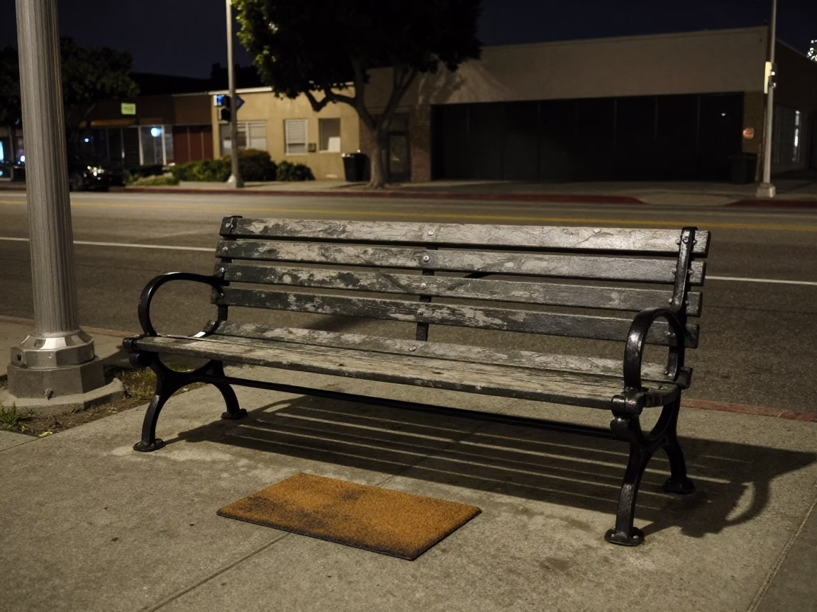Nighttime Los Angeles Street Scene with Vintage Park Bench and Doormat Detail in in Los Angeles, California, United States