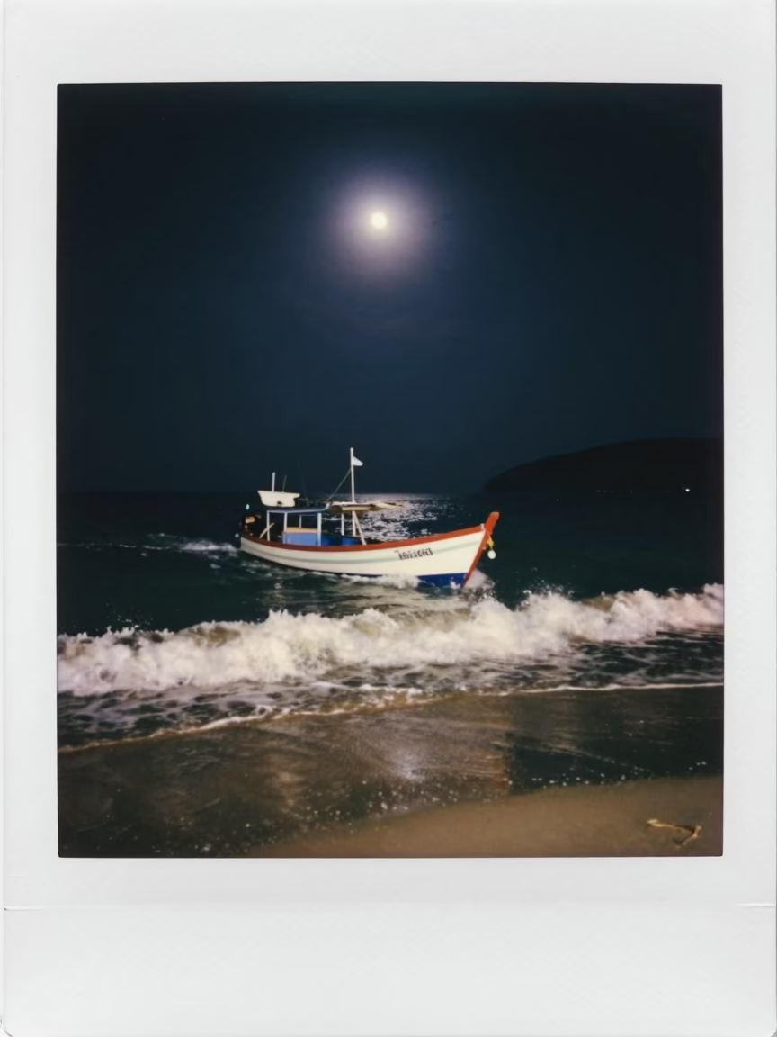 Nighttime Phuket Beach Scene with Fishing Boat Returning Through Crashing Surf Under Moonlight in in Phuket, Thailand