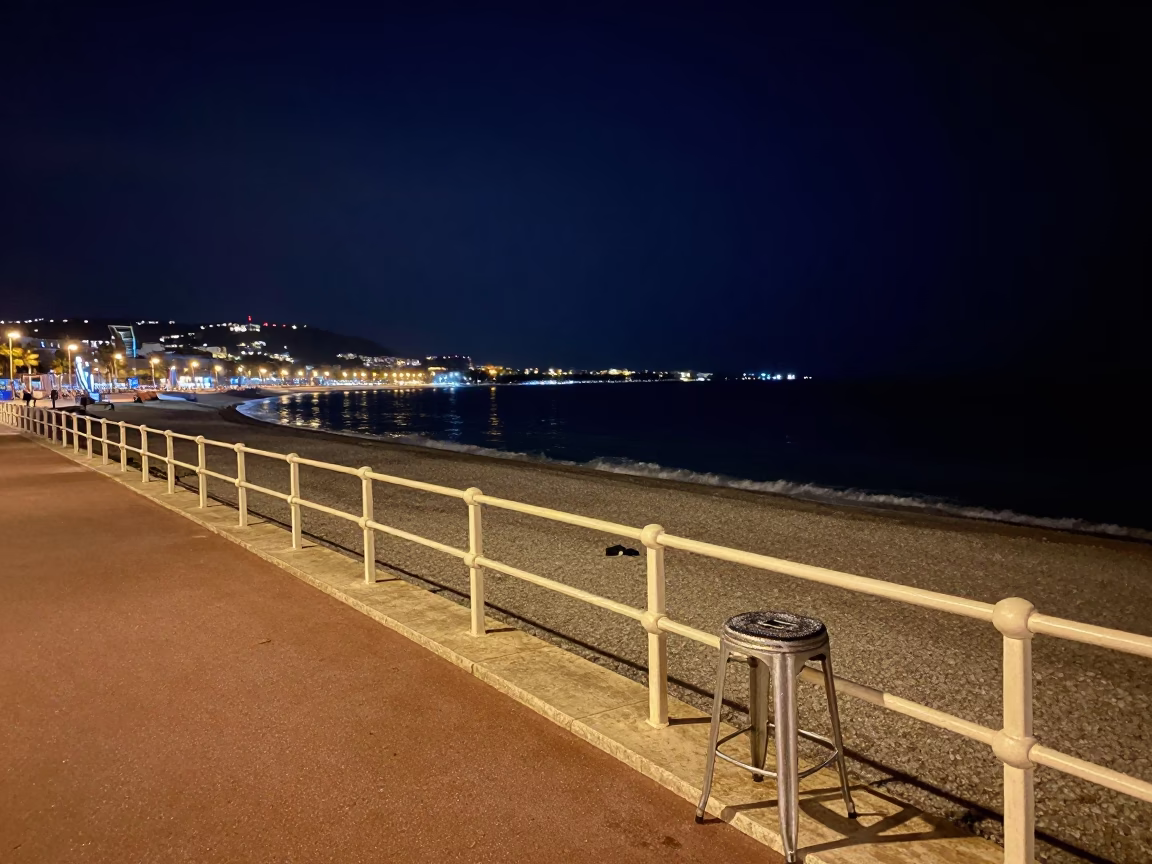 Nighttime Promenade des Anglais in Nice France with condensation on stool leg in in Nice, France