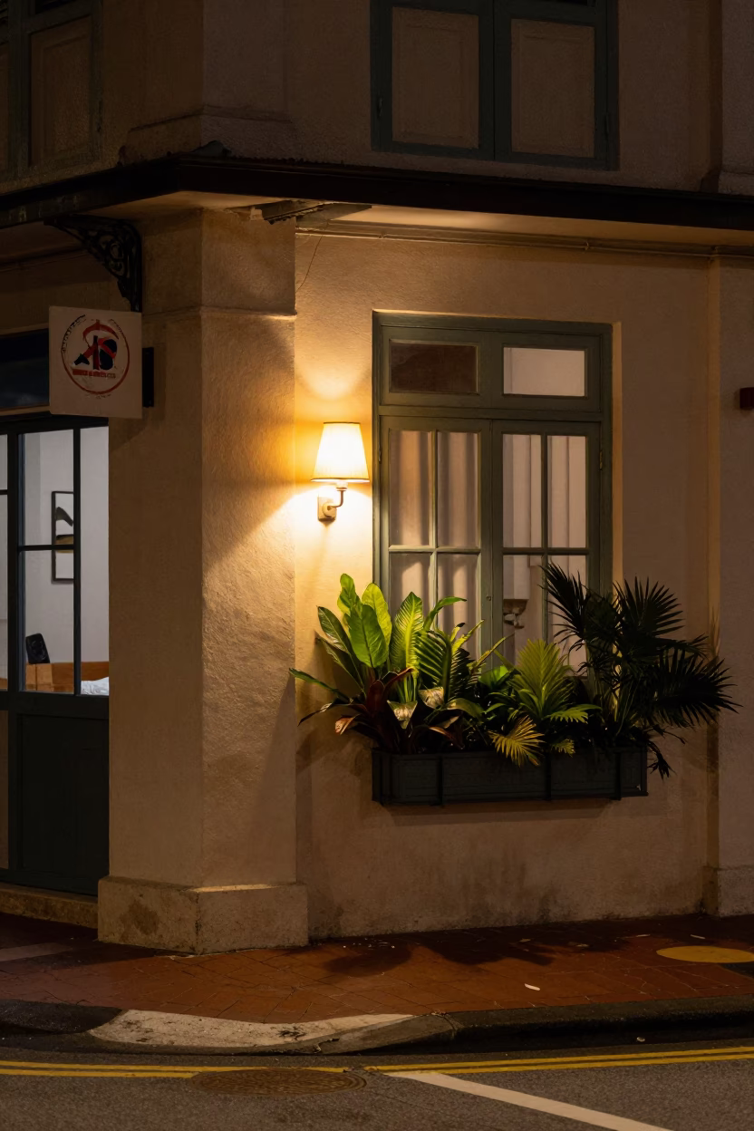 Nighttime Singapore Street Corner with Bedside Lamp and Window Box in 1980s Realistic Photograph in in Singapore, Singapore