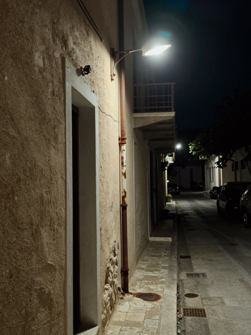 Nighttime Street Scene in Athens Greece with Rusty Hinge and Hand Broom in in Athens, Greece