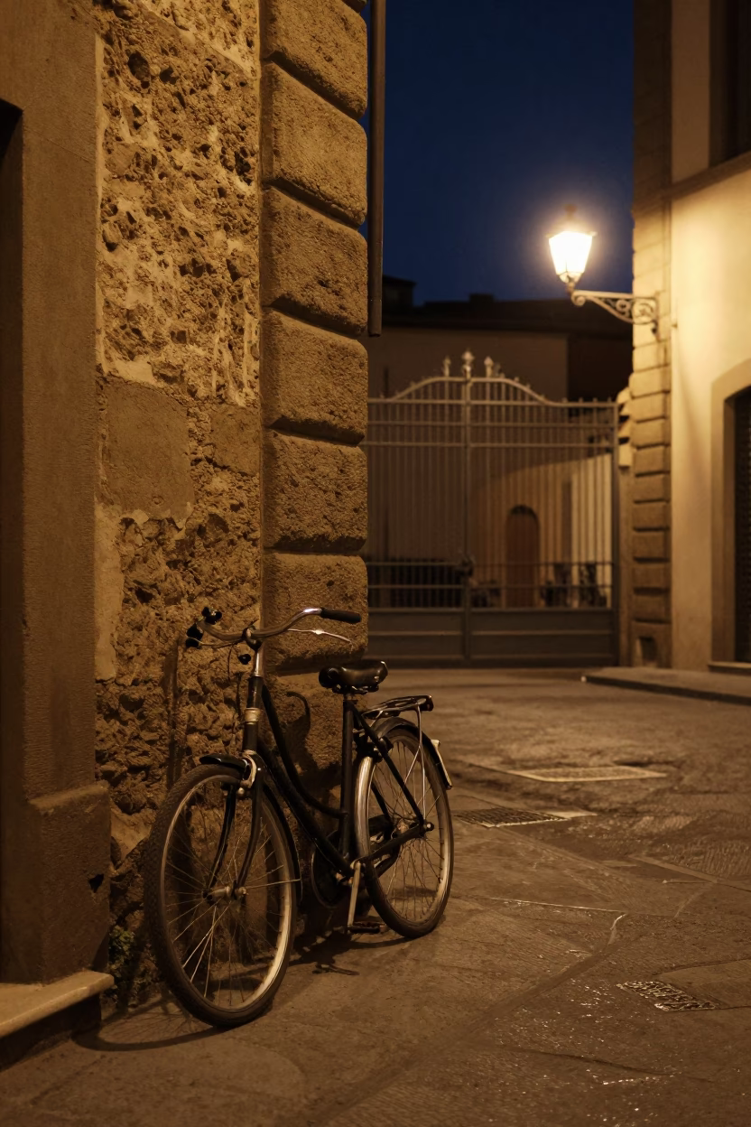 Nighttime Street Scene in Florence Italy with Vintage Bicycle and Gate Handle in in Florence, Italy