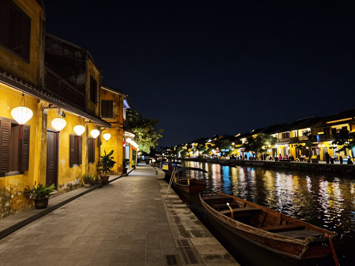 Nighttime Street Scene in Hoi An Vietnam with Lanterns and River Activity in in Hoi An, Vietnam