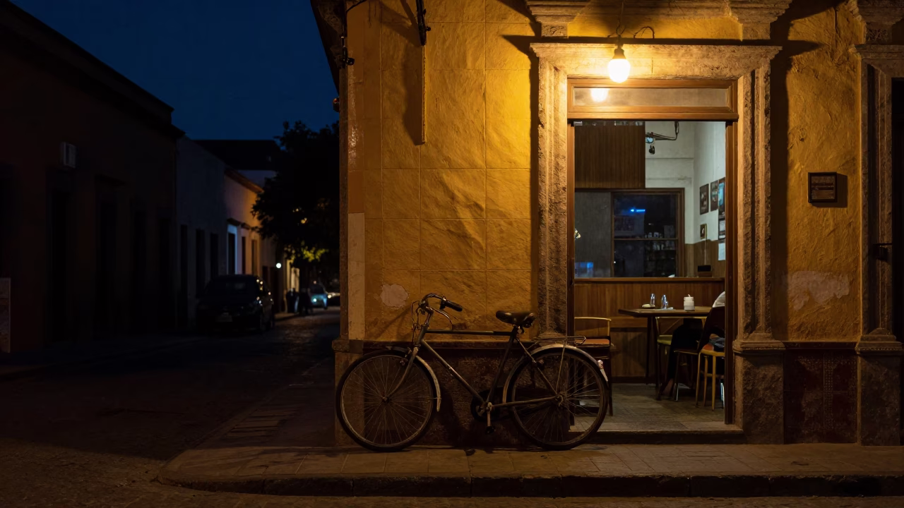 Nighttime Street Scene in Mexico City With Bicycle Leaning Against Cafe in in Mexico City, Mexico