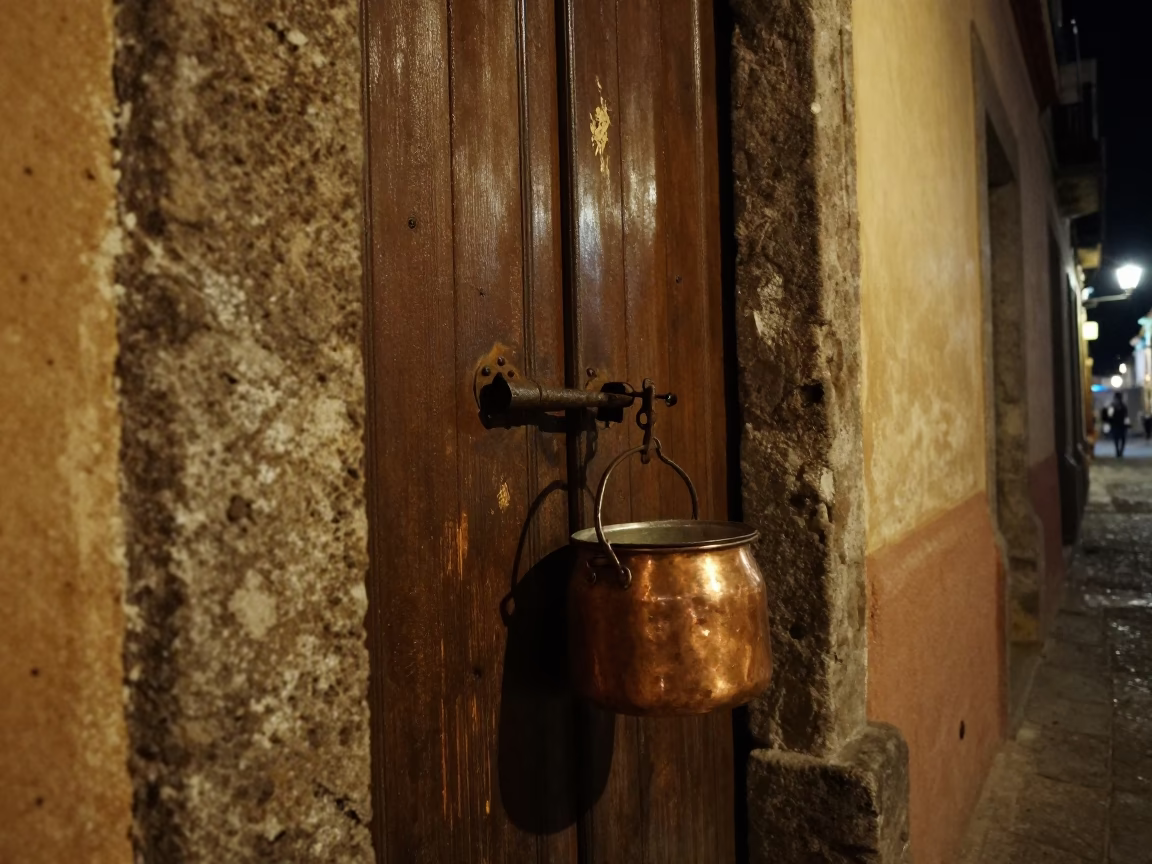 Nighttime Street Scene in Oaxaca Mexico with Copper Pot and Latch Detail in in Oaxaca, Mexico