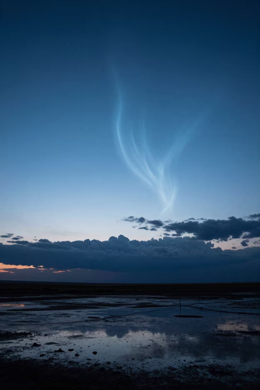 Noctilucent Clouds Glow Over Wet Plain Near Adana in across a storm-bright plain near Adana