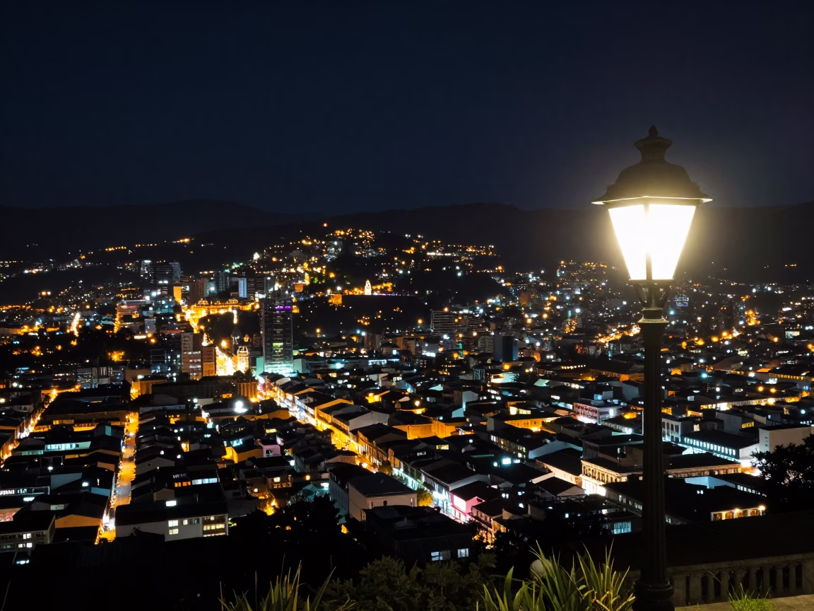 Nocturnal Quito Cityscape View from Historic District Street Lamp in in Quito, Ecuador