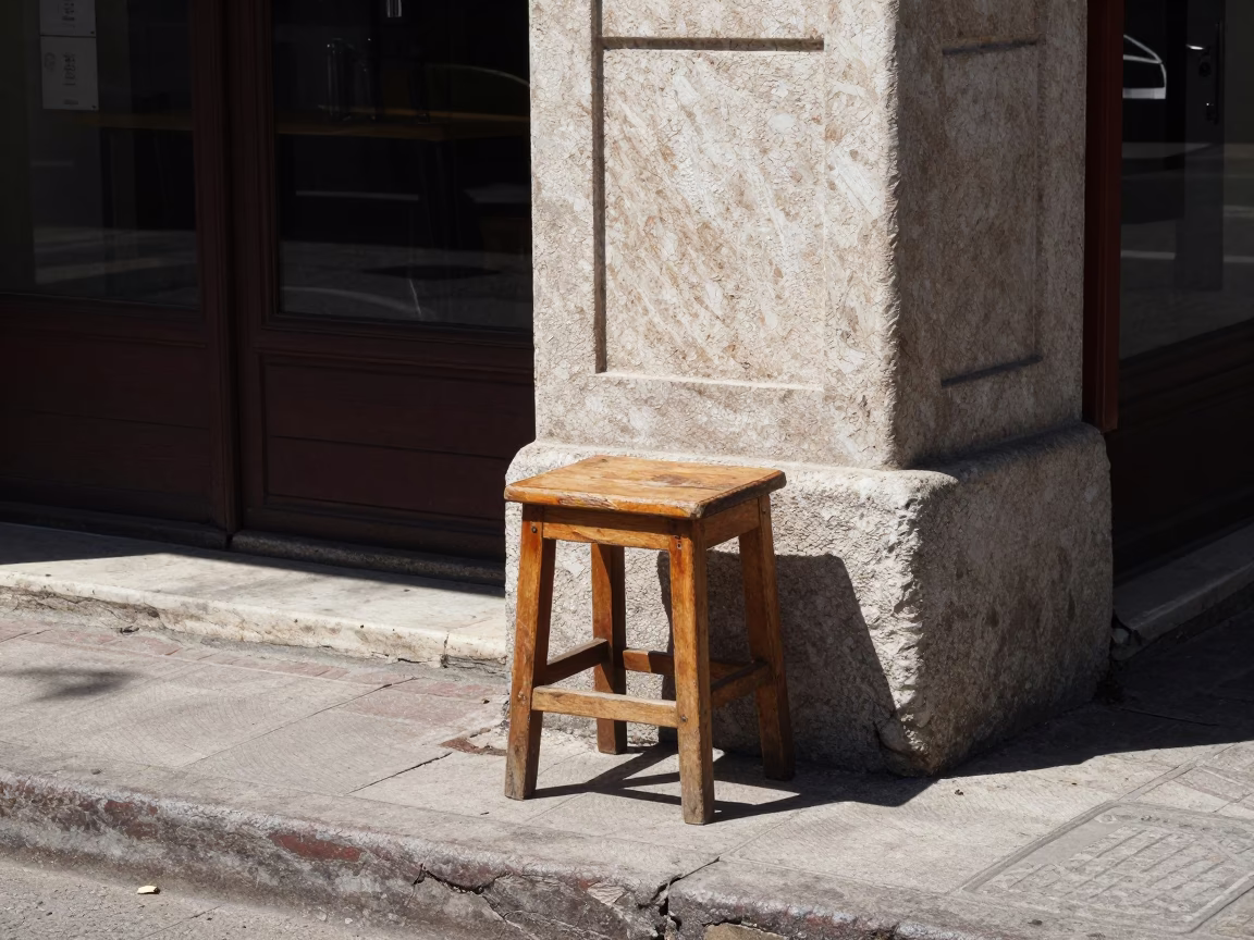 Noon light in Istanbul street corner with wooden stool and dust in in Istanbul, Turkey