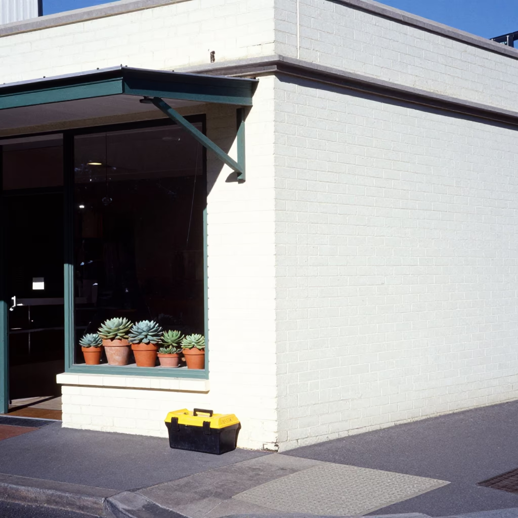 Noon Light on Adelaide Street Corner with Toolbox and Potted Succulents in in Adelaide, South Australia, Australia