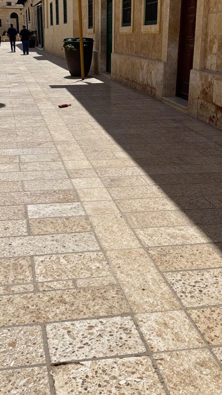 Noon Light on Amman Stone Street with Sun Stripe and Park Bench in in Amman, Jordan