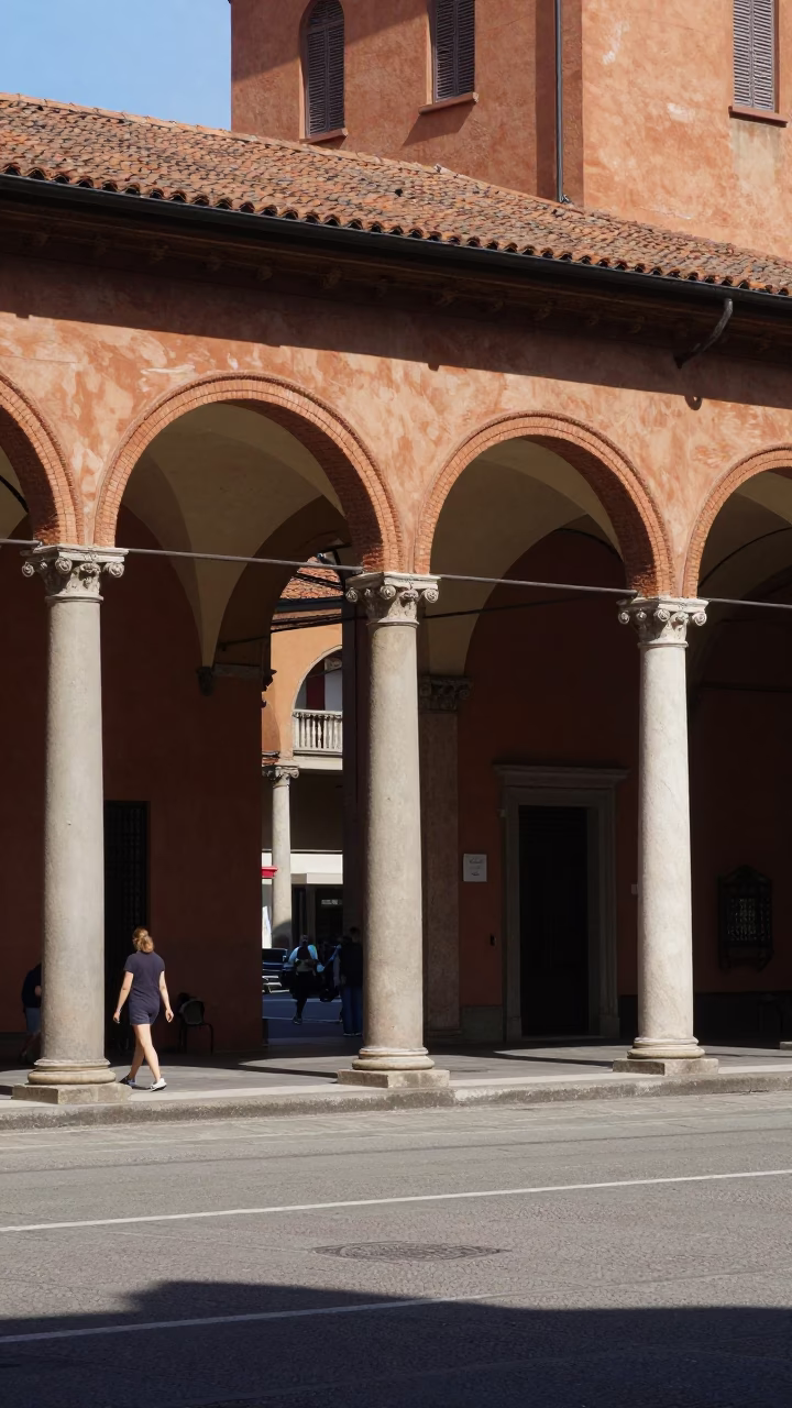 Noon Light on Bologna Porticoes and Local Street Life in Italy in in Bologna, Italy