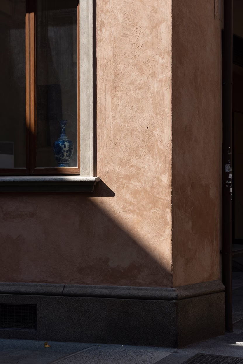 Noon Light on Bologna Street Corner with Blue Porcelain Jar and Fingerprints in in Bologna, Italy