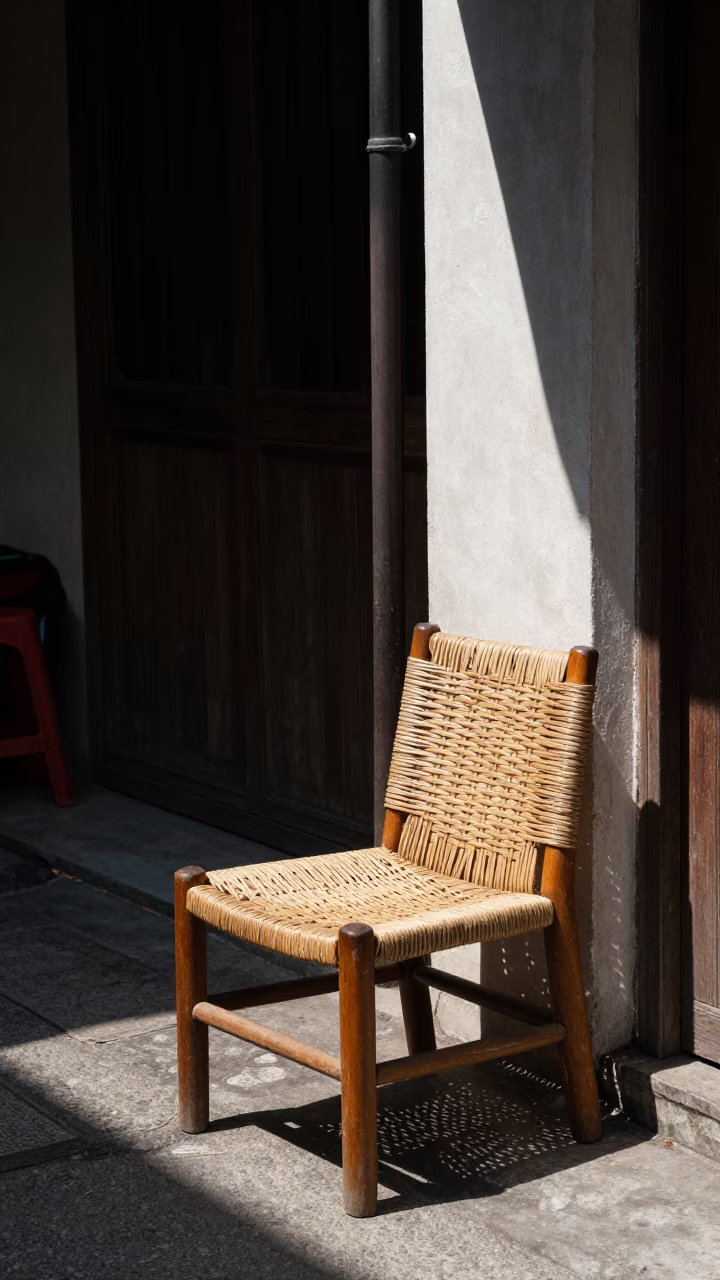 Noon Light on Kuala Lumpur Street with Woven Chair and Wash Basin in in Kuala Lumpur, Malaysia