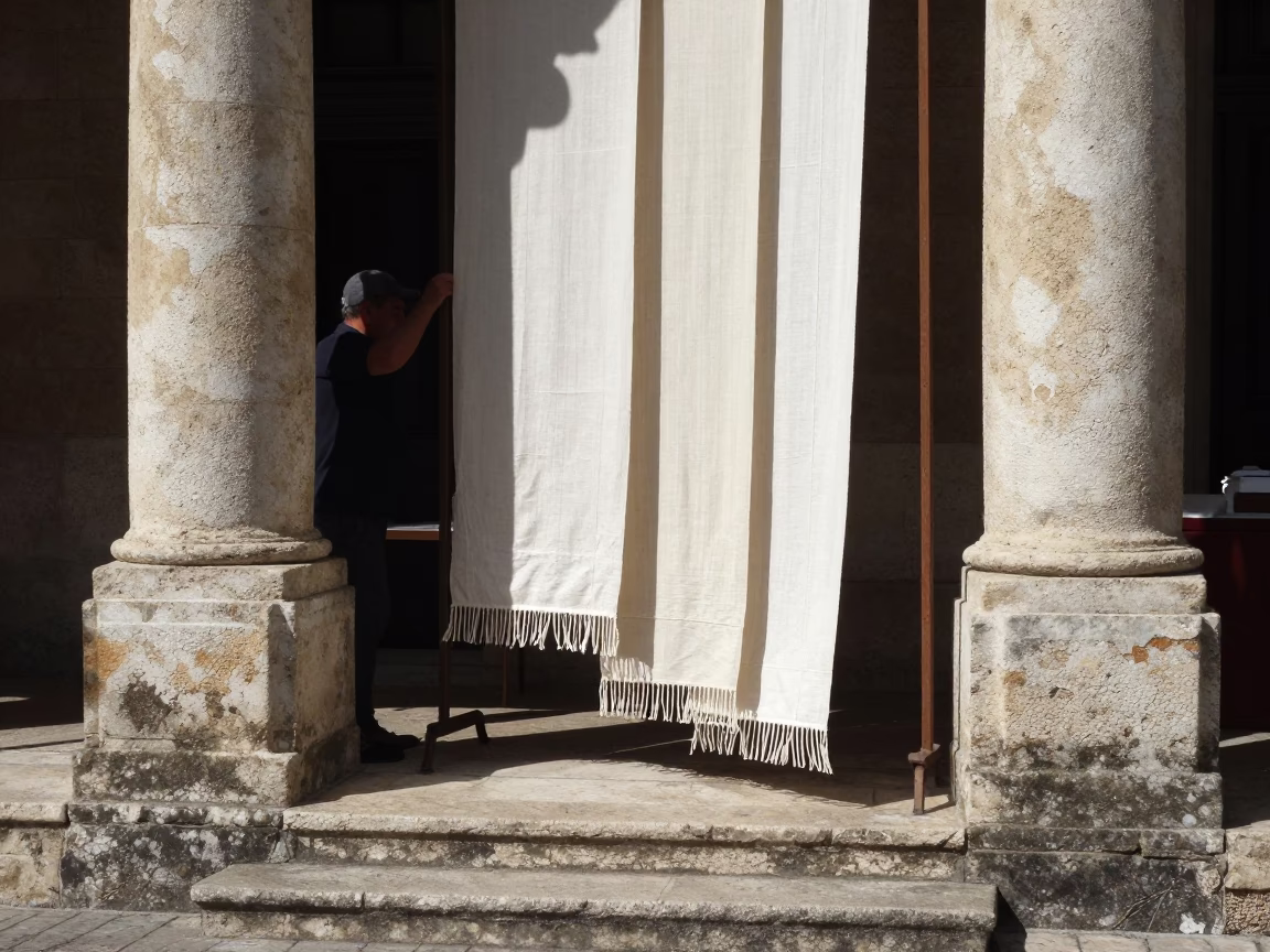 Noon light on Lyon traboules with linen fabric and paint details in in Lyon, France