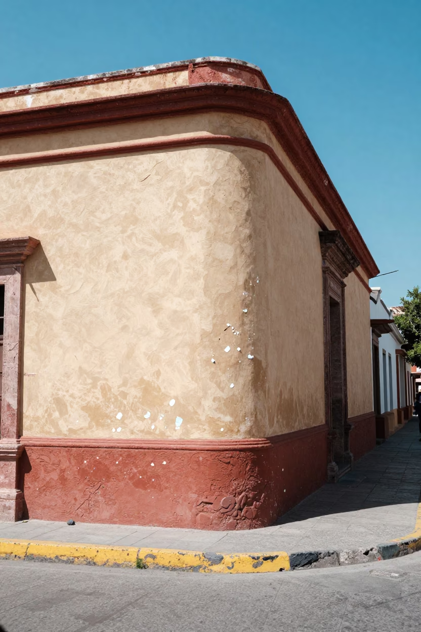 Noon Light on Merida Street Corner with Paint Flecks and Wicker Basket in in Merida, Mexico